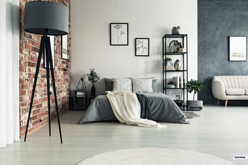 Grey bedroom with floor lamp