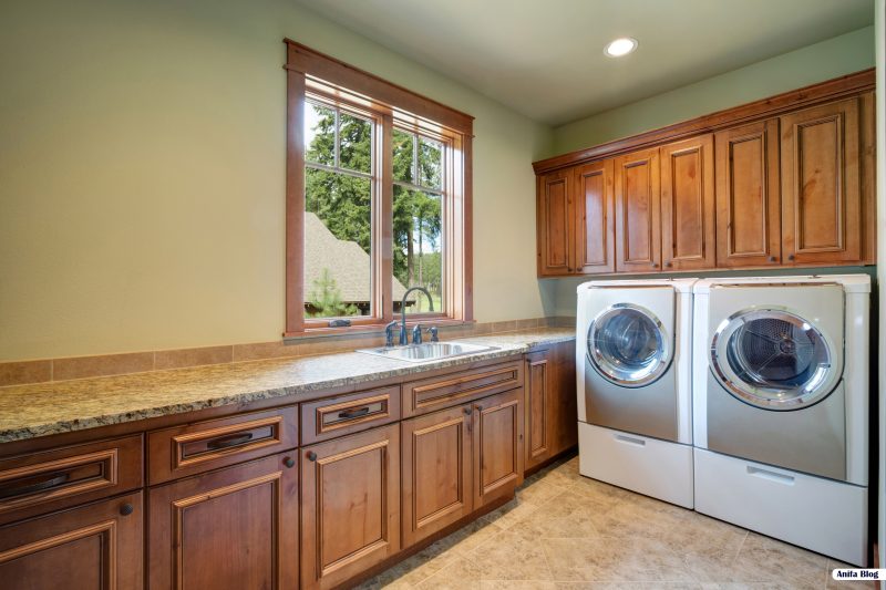 Huge laundry room with white washer