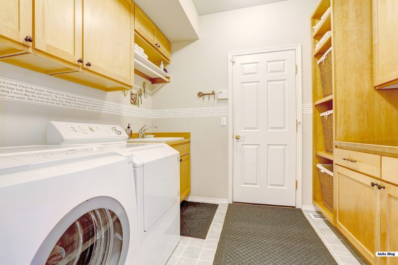 Bright laundry room with storage combination