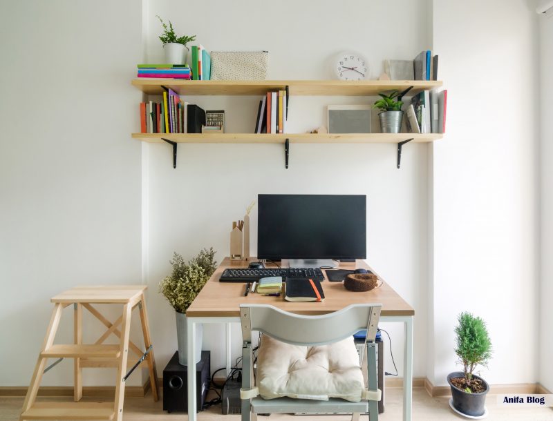 home office with storage cabinets on the wall