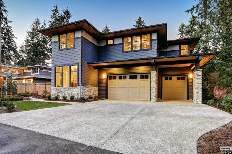 Modern style home boasts two car garage