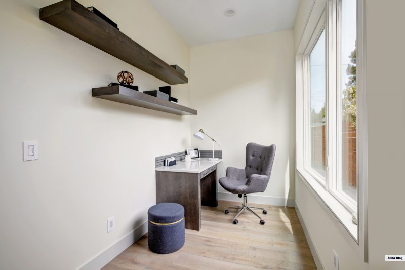 small home office interior with corner desk